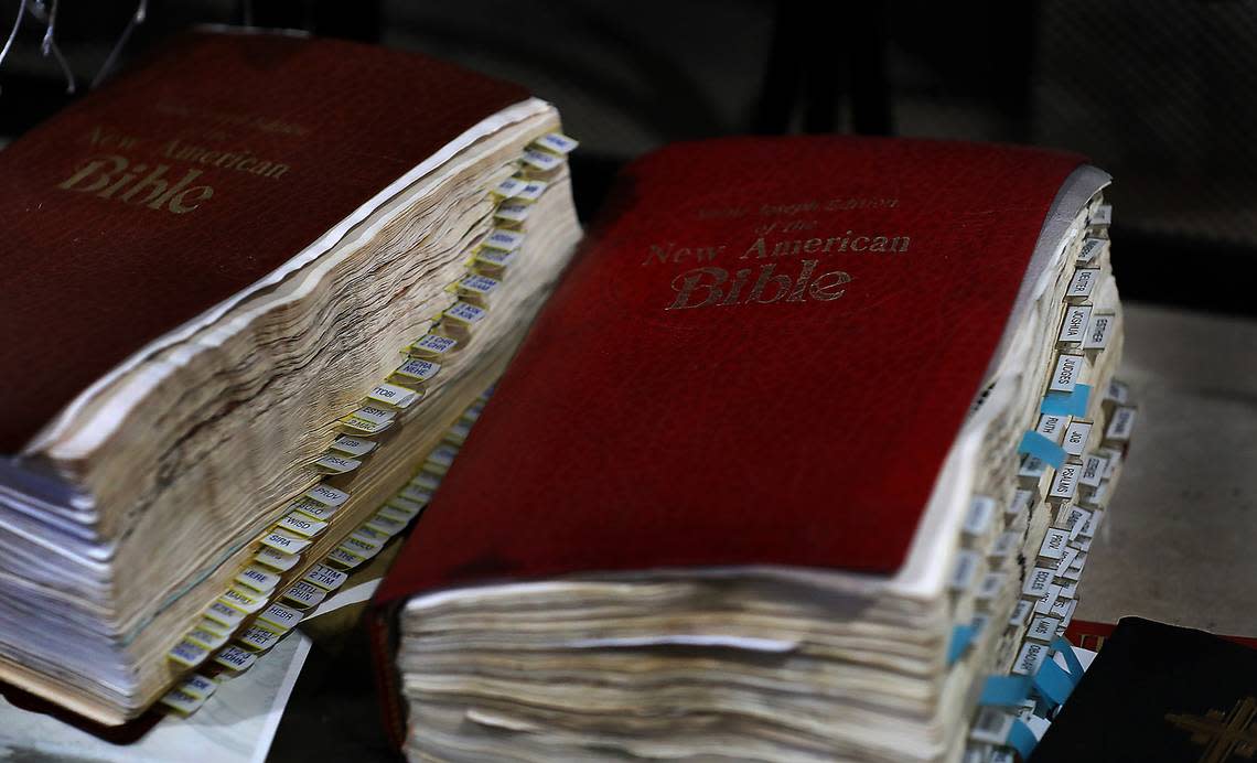 A pair of well-used Bibles belonging to Lillian and Ernesto Parra were among the very few personal items recovered from their fire-damaged home.