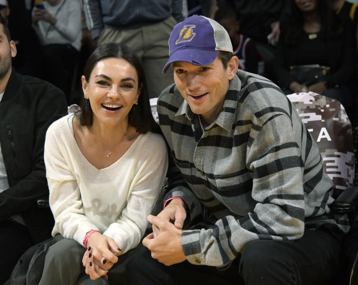 Mila Kunis and Ashton Kutcher enjoy the Los Angeles Lakers game on November 13, 2022. 