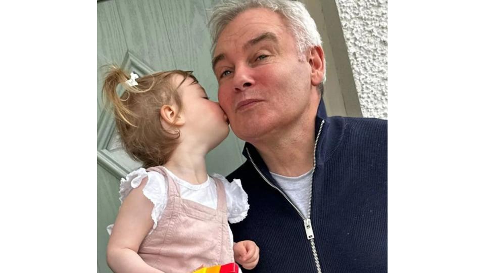 Eamonn Holmes getting a kiss from his granddaughter