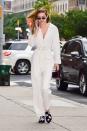 <p>In a Tamuna Ingorokva jumpsuit with Sanayi 313 slippers and a Stalvey mini purse while out in New York City.</p>