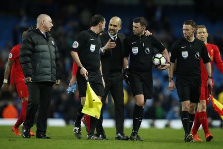 Manchester City v Liverpool - Premier League - Etihad Stadium - 19/3/17 Manchester City manager Pep Guardiola speaks with referee Michael Oliver after the game Reuters / Andrew Yates Livepic