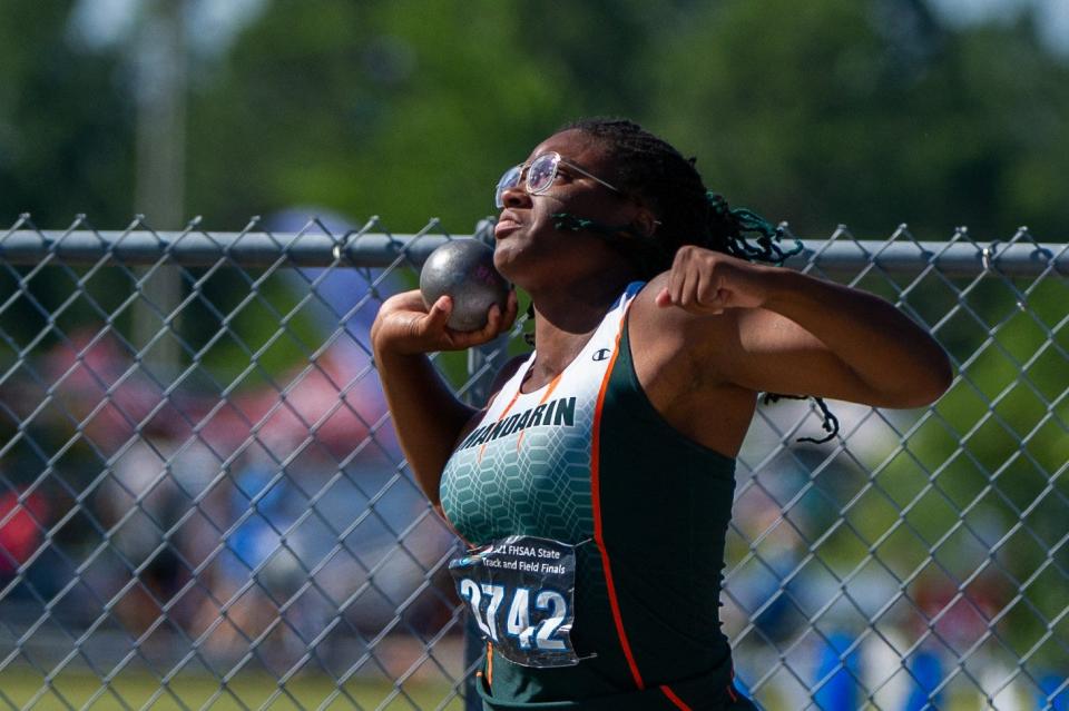 Da'Moni Kelly of Mandarin throws the shot put at the FHSAA Championships in May 2021.