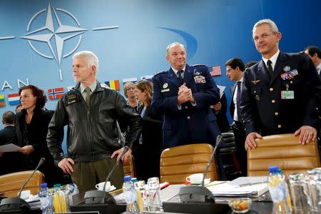 NATO Supreme Allied Commander, U.S. Air Force General Philip Breedlove (C) stands with Chairman of the NATO Military Committee, Czech Army General Petr Pavel (L) and Supreme Allied Commander Transformation (SACT), French Air Force General General Denis Mercier (R) at the start of the NATO Ministerial Meeting on the South, Partnerships, and Defense Capacity at NATO Headquarters in Brussels, Belgium December 1, 2015. REUTERS/Jonathan Ernst