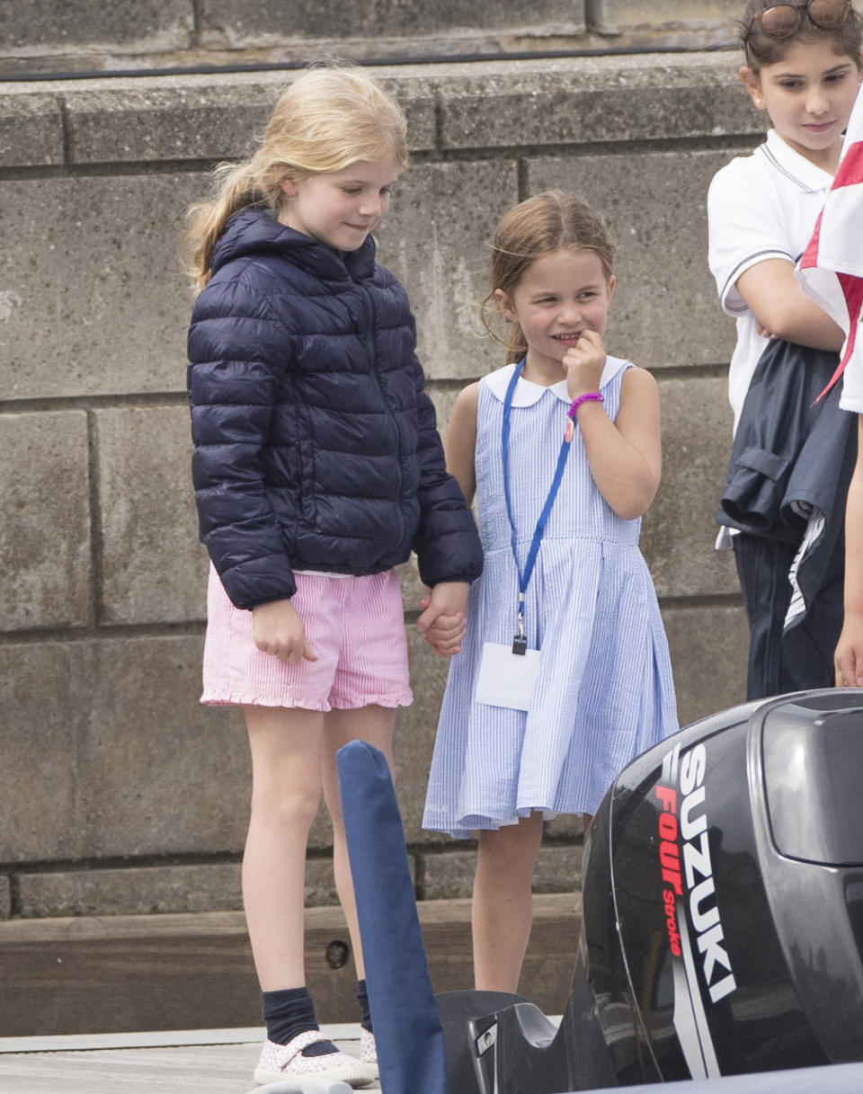 COWES, ENGLAND - AUGUST 08: Princess Charlotte (C) at The Royal Yacht Squadron during the inaugural Kings Cup regatta hosted by the Duke and Duchess of Cambridge on August 08, 2019 in Cowes, England. Their Royal Highnesses hope that The Kings Cup will become an annual event bringing greater awareness to the wider benefits of sport, whilst also raising support and funds for Action on Addiction, Place2Be, the Anna Freud National Centre for Children and Families, The Royal Foundation, Child Bereavement UK, Centrepoint, Londonís Air Ambulance Charity and Tusk. on August 08, 2019 in Cowes, England. (Photo by Antony Jones/Getty Images)