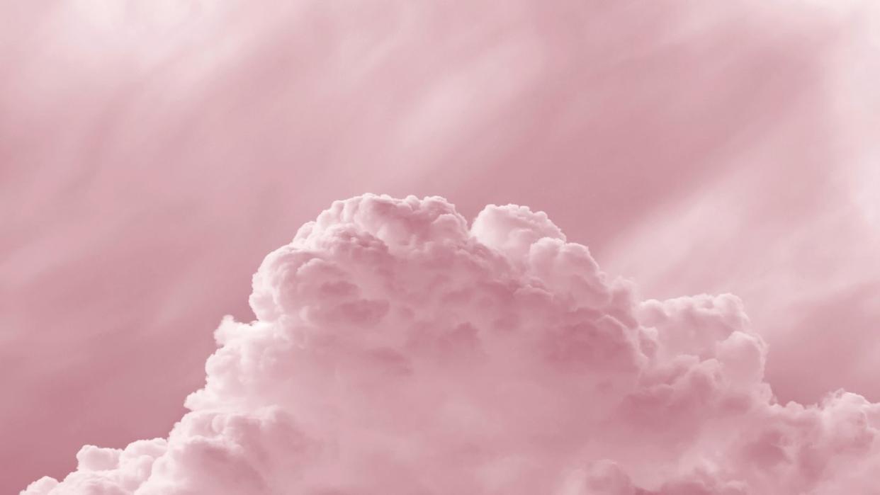 full frame of the abstract background with colorful clouds on a pink background