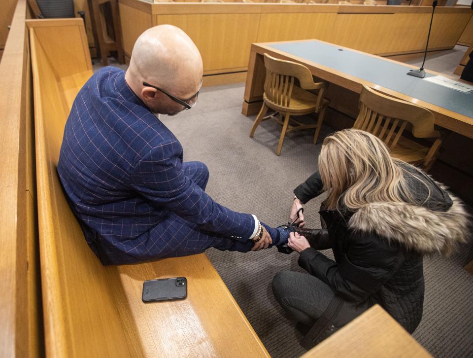 Andrew Krivak has an ankle monitoring device removed after he was acquitted in the rape and murder of 12-year-old Josette Wright in Putnam Court on Feb. 27, 2023.