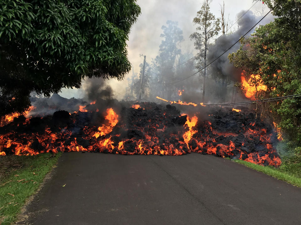 A lava flow moves on Makamae Street after&nbsp;an eruption on Sunday.