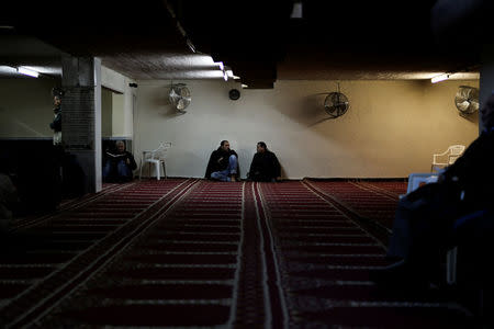 Muslims living in Greece attend Friday prayers at the Masjid Al-Salam makeshift mosque in Athens, Greece, February 3, 2017. REUTERS/Alkis Konstantinidis