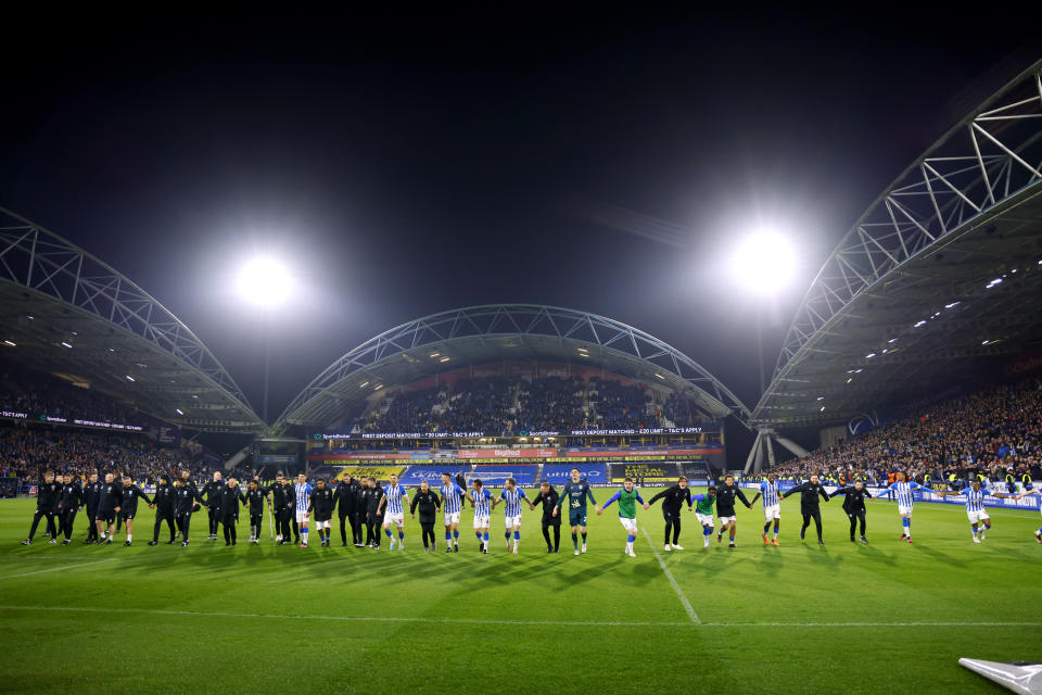 Huddersfield secured their Championship status after beating Sheffield United in their final home game of the season