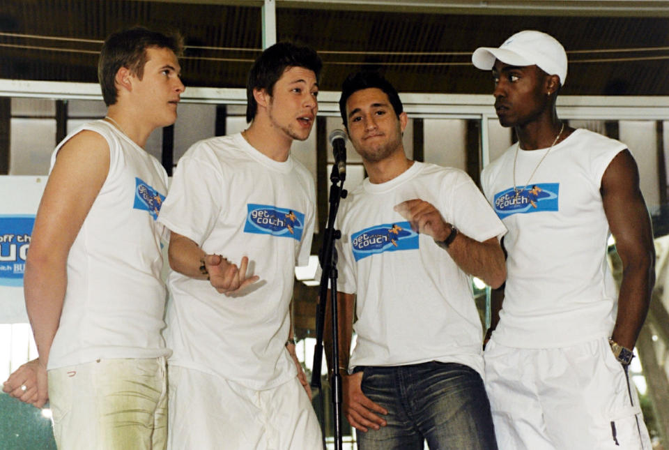 Boy band Blue (from left) Lee Ryan, Duncan James,  Anthony Costa and Simon Webbe  at the Crystal Palace National Sports Centre, London, fot the launch of a new website 'Get off the couch', encouraging children to do more exercise.   (Photo by Yui Mok - PA Images/PA Images via Getty Images)