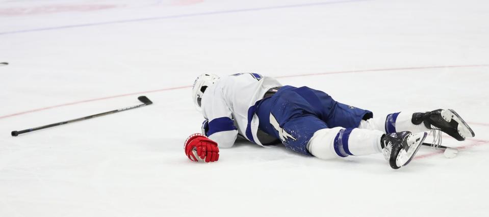 Tampa Bay Lightning right wing Mathieu Joseph after being punched by Detroit Red Wings center Dylan Larkin during the second period in the season opener at Little Caesars Arena, Thursday, Oct. 14, 2021.