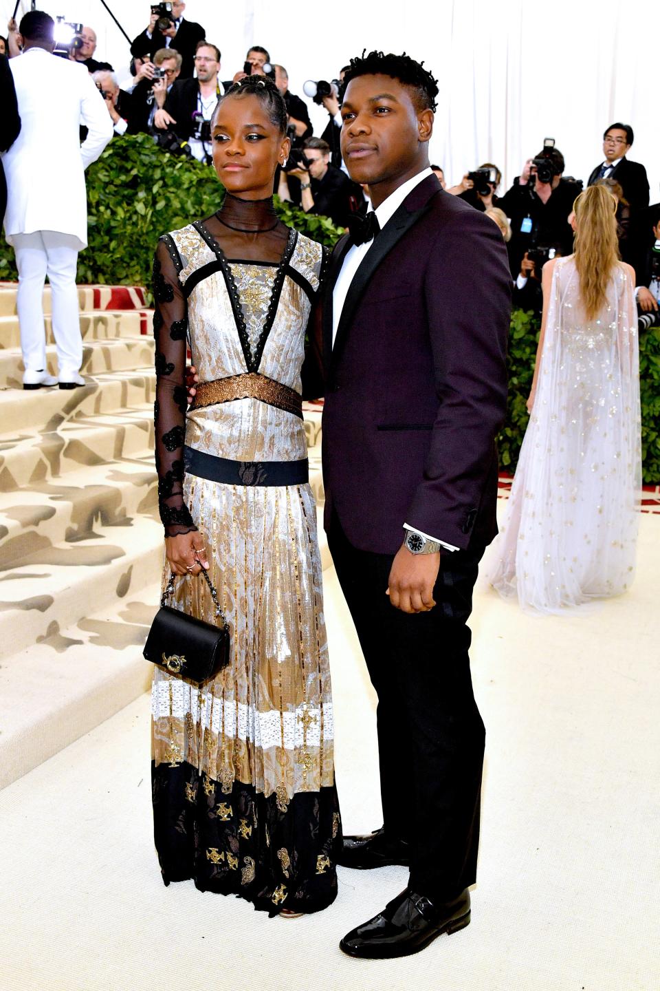 <h1 class="title">Letitia Wright in custom Coach and Forevermark jewelry and John Boyega in Michael Kors Collection</h1><cite class="credit">Photo: Getty Images</cite>