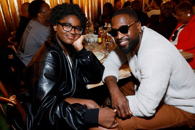 <p>Matt Winkelmeyer/Getty </p> Zaya Wade and Dwyane Wade attend Wade's 'When We Gather' stand-up comedy event on May 9, 2024