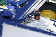 An engineer assembles a Blue River Technology See & Spray agricultural machine that combines computer vision and artificial intelligence to detect and precisely spray herbicides onto weeds in a farm field in Sunnyvale, California, April 23, 2018. REUTERS/ Stephen Lam