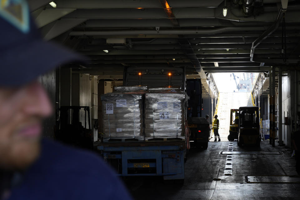 A truck carrying Gaza aid enter a U.S ship for unloading, at the port of Larnaca, Cyprus, Wednesday, June 26, 2024. An official with the U.S. humanitarian assistance agency USAID says thousands of tons of food, medicines and other aid piled up on a Gaza beach isn't reaching those in need because of a dire security situation on the ground where truck drivers are either getting caught in the crossfire or have their cargo seized by "gang-like" groups. (AP Photo/Petros Karadjias)