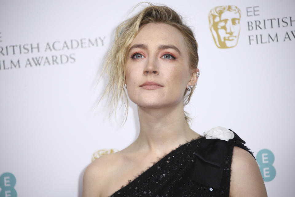 Actress Saoirse Ronan poses for photographers upon arrival at the Bafta Nominees Party, in central London, Saturday, Feb. 1, 2020. (Photo by Joel C Ryan/Invision/AP)