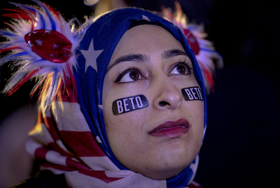 Muna Hussaini listens to Democratic presidential candidate and former Texas congressman Beto O'Rourke speak during a presidential campaign rally kickoff on Saturday, March 30, 2019, in Austin, Texas. (Kick Wagner/Austin American-Statesman via AP)