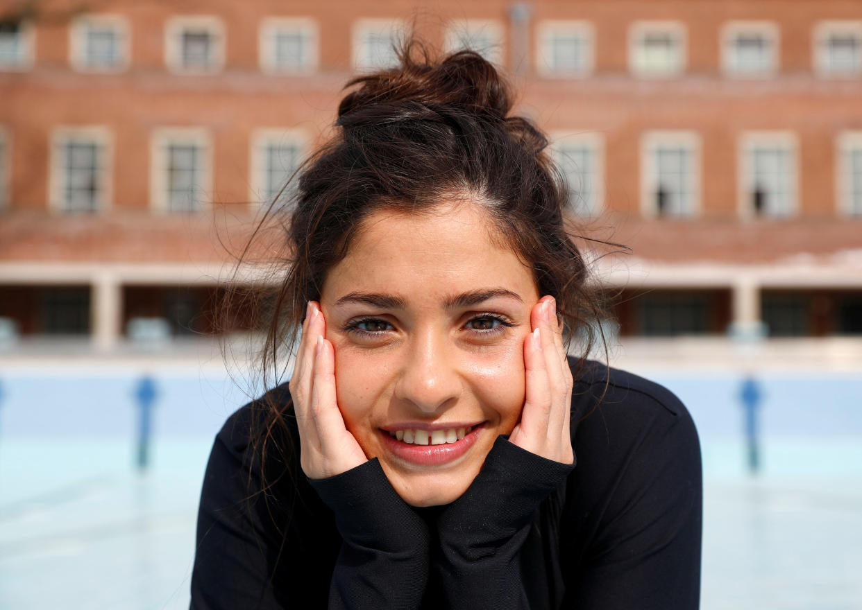 Syrian refugee and Olympic swimmer Yusra Mardini poses for the photographer after a training session in a pool at the Olympic park in Berlin, Germany, April 12, 2018. Picture taken April 12, 2018. REUTERS/Fabrizio Bensch