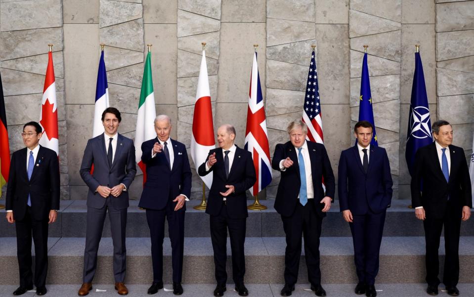 Japanese Prime Minister Fumio Kishida, Canadian Prime Minister Justin Trudeau, US President Joe Biden, German Chancellor Olaf Scholz, UK Prime Minister Boris Johnson, French President Emmanuel Macron and Italian Prime Minister Mario Draghi pose at the G7 summit in Brussels - Henry Nicholls