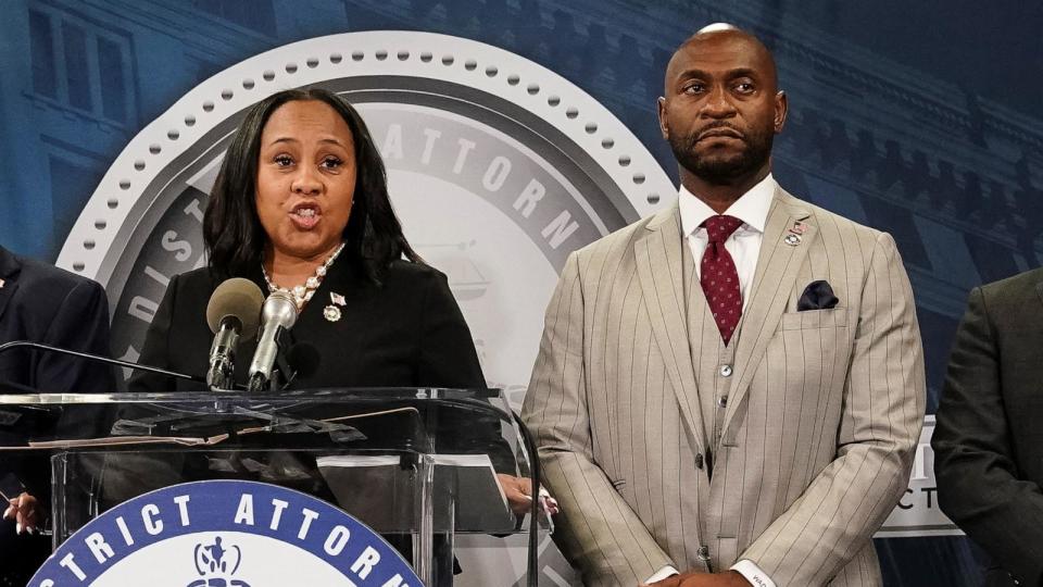 PHOTO: Fulton County District Attorney Willis speaks at a press conference next to prosecutor Wade after a Grand Jury brought back indictments against Trump and allies in their attempt to overturn the state's 2020 election results, Atlanta, Aug. 14, 2023. (Elijah Nouvelage/Reuters, FILE)