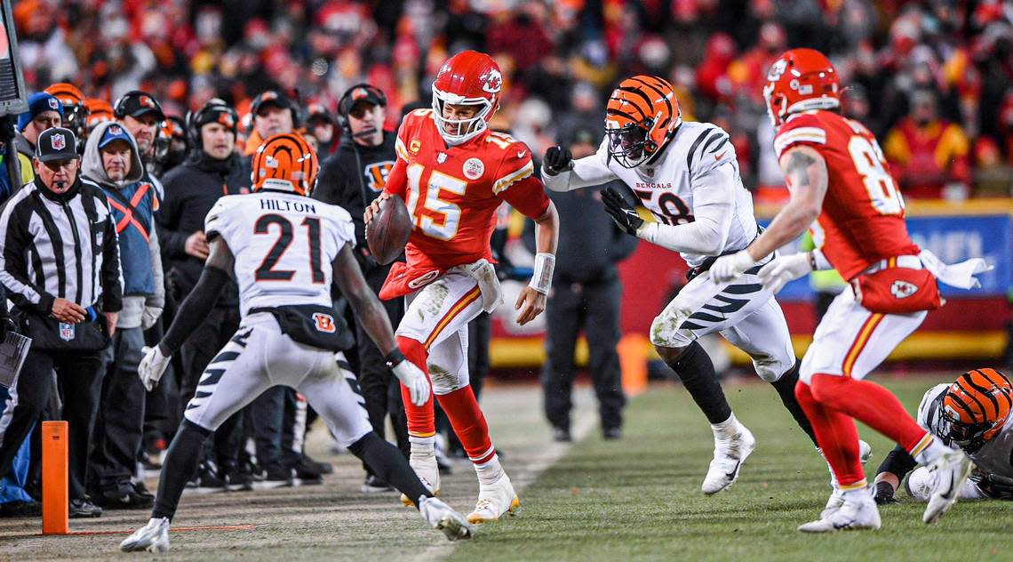 Kansas City Chiefs quarterback Patrick Mahomes runs out of bounds in the final seconds of the game before being pushed by Cincinnati Bengals defensive end Joseph Ossai during the AFC Championship Game Sunday, Jan. 29, 2023, at GEHA Field at Arrowhead Stadium. The push drew an unnecessary roughness call which put the Chiefs in range for the game-winning field goal.