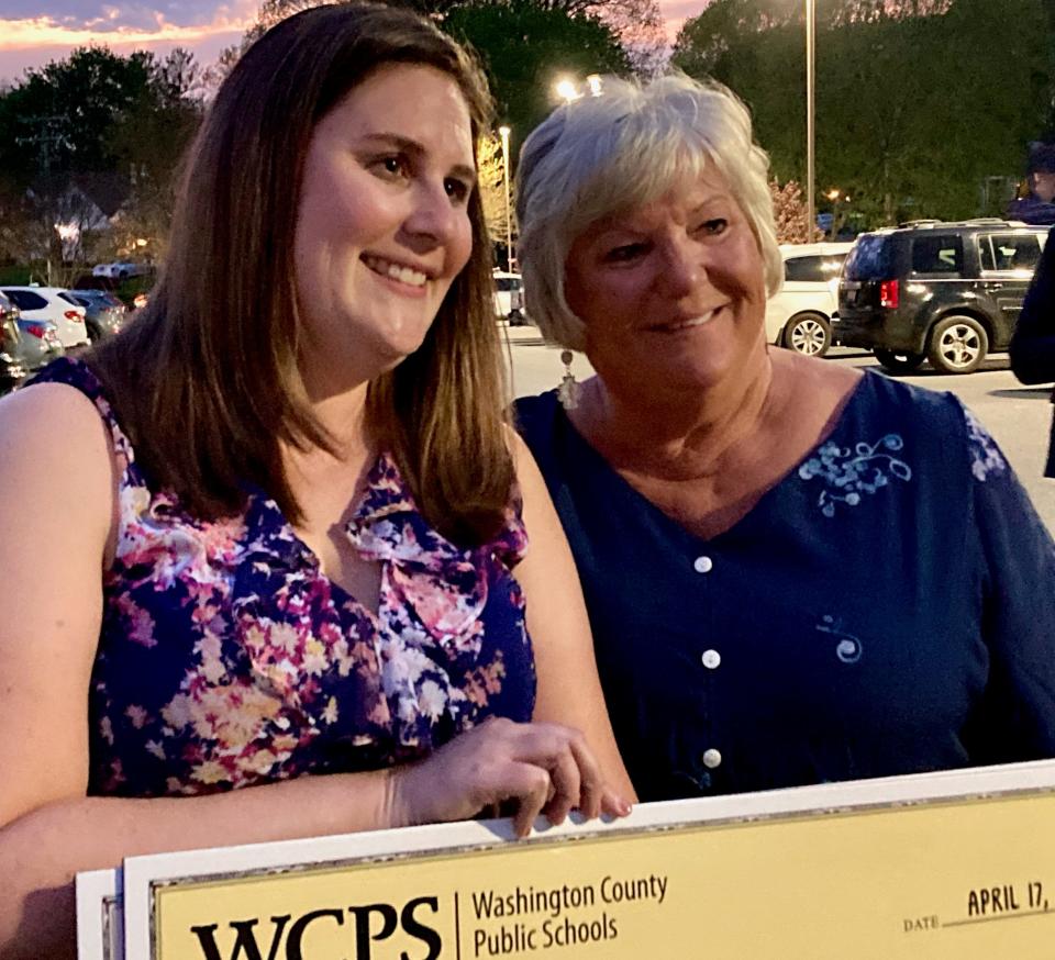 Brittany Collins and her mother, Jewel, pose with Collin's celebratory $5,000 check from Washington County Public Schools on Wednesday evening after Collins was named the 2024-2025 WCPS Teacher of the Year. The event was held at the Fountain Head Country Club.