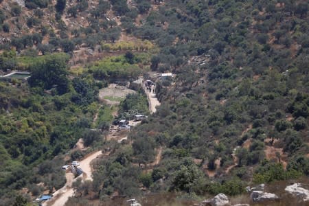 View shows the scene of an explosion near the Jewish settlement of Dolev in the Israeli-occupied West Bank