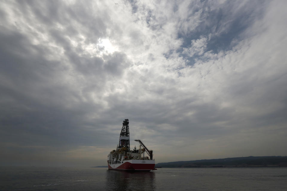 Turkey's 230-meter (750-foot) drillship 'Yavuz' crosses the Marmara Sea on its way to the Mediterranean, from the port of Dilovasi, outside Istanbul, Thursday, June 20, 2019. Turkey had launched Yavuz, that it says will drill for gas off neighbouring Cyprus despite European Union warnings to refrain from such illegal actions that could incur sanctions against Ankara.(AP Photo/Lefteris Pitarakis)