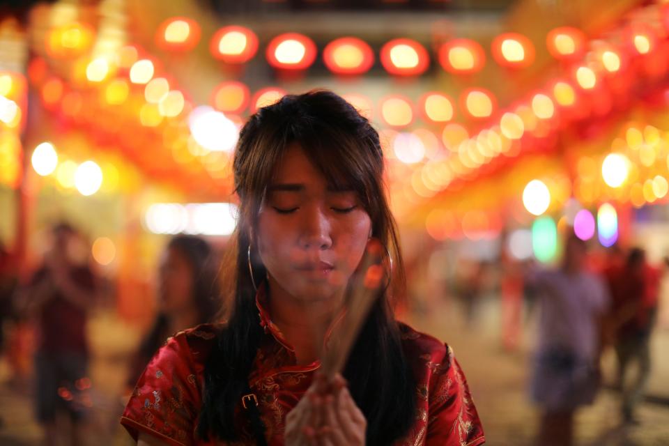 lunar new year praying incense