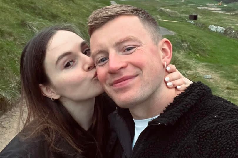 Adam Peaty and Holly Ramsay in the countryside