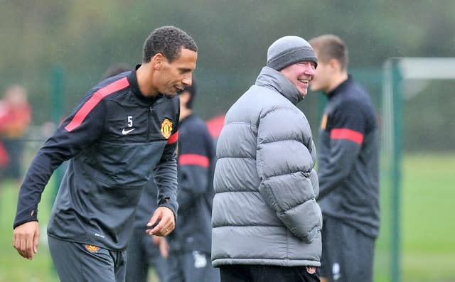 Rio Ferdinand, left, alongside his former boss at Manchester United Sir Alex Ferguson