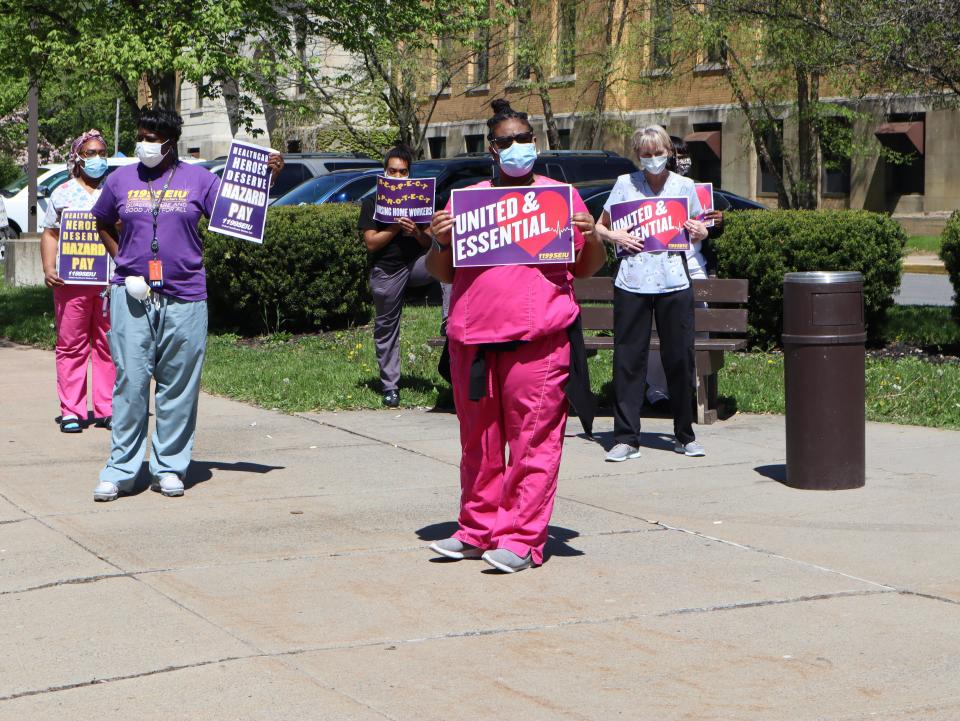 Standing 6 feet apart, staff at Oneida Center for Rehabilitation and Nursing in Utica protested from 2:30 to 3 p.m. Thursday outside their workplace on Kemble Street. Workers were asking for hazard pay, more staff and an acknowledgment that they are working in hazardous conditions during the coronavirus pandemic. "I think it's something that's long overdue ... ," said LPN Fatima Howard. "The workload has started to triple."