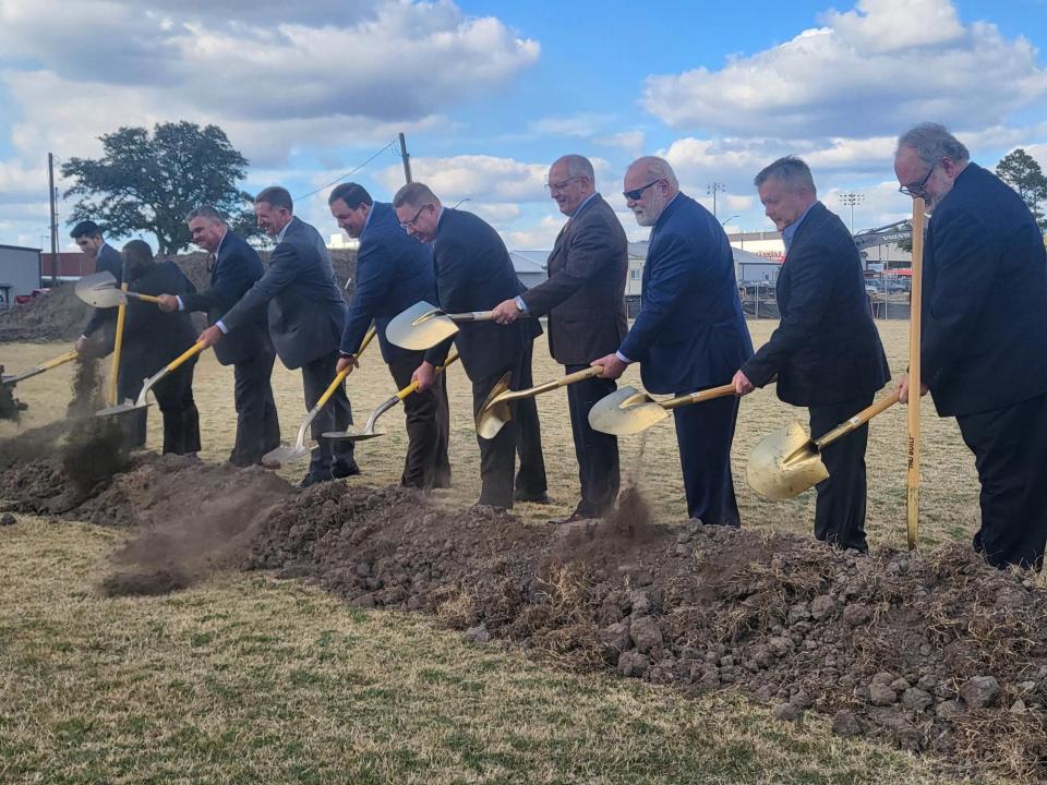 State and local officials gather to celebrate the groundbreaking, October 7, of a coastal research center to be constructed at Nicholls State University. The $21 million research center will focus ways to address coastal land loss.