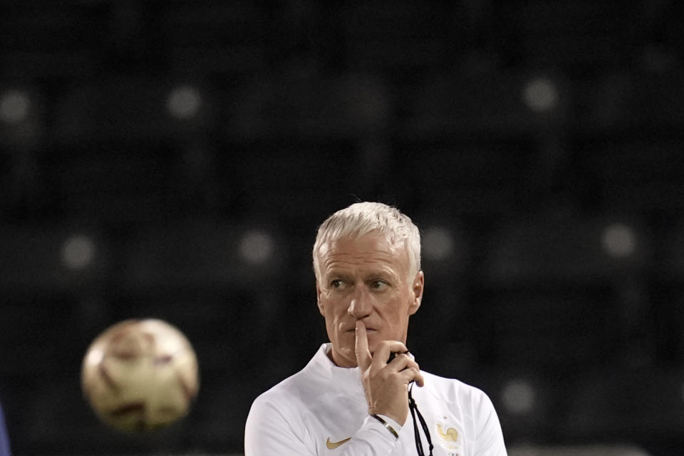 France's head coach Didier Deschamps supervises a training session at the Jassim Bin Hamad stadium in Doha, Qatar, Friday, Dec. 16, 2022. France will play against Argentina during their World Cup final soccer match on Dec. 18. (AP Photo/Christophe Ena)