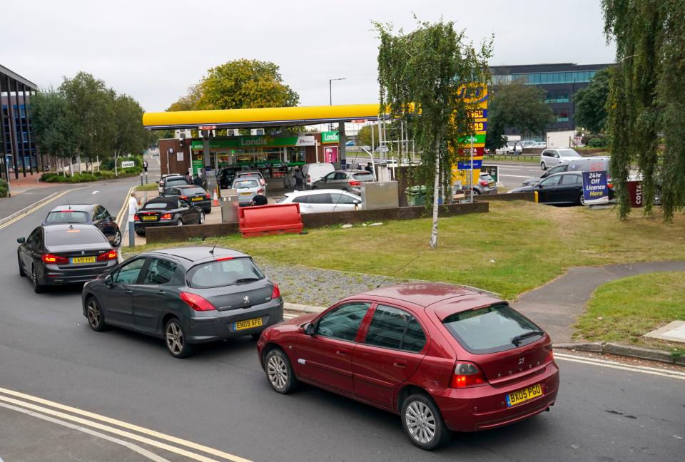 Cars queue outside petrol station in in Slough, Berkshire (PA)