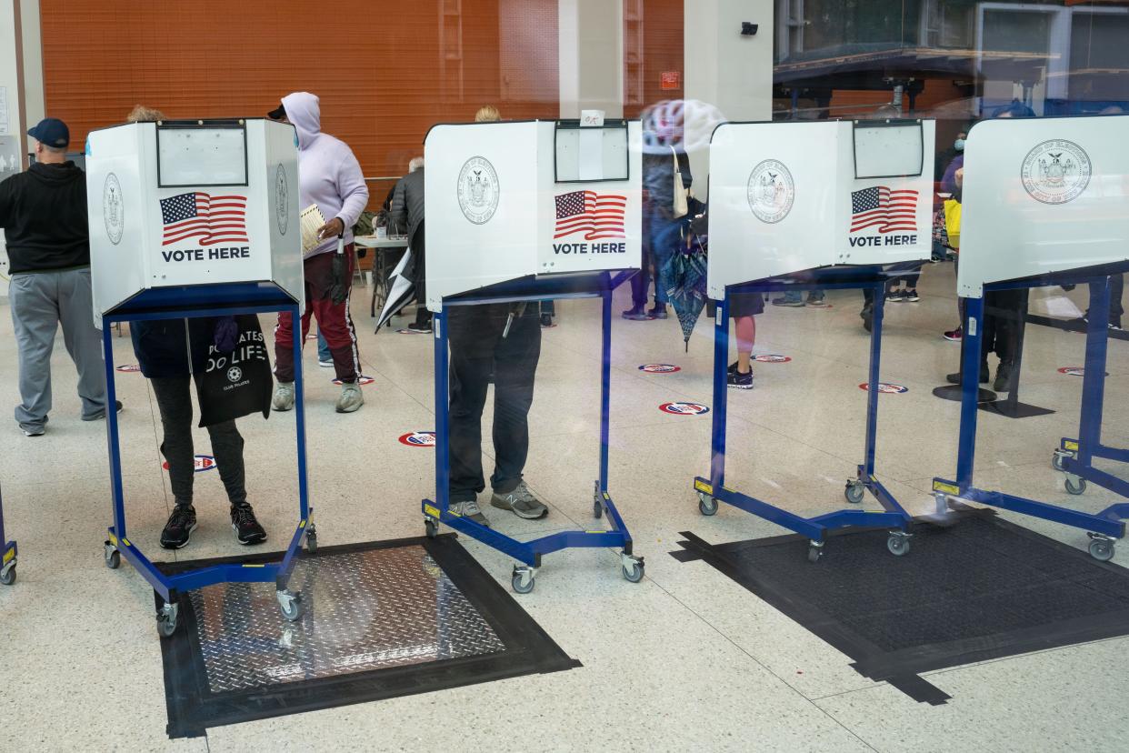 People vote at the New York City College of Technology on Jay Street in Brooklyn on Monday October 26, 2020. 