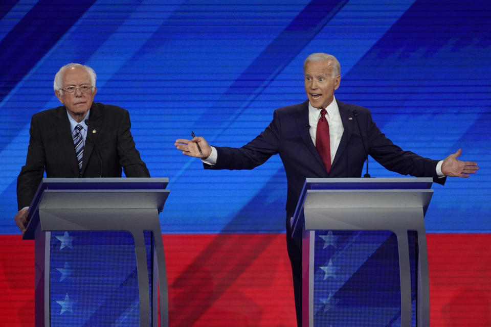 Sen. Bernie Sanders, I-Vt., left, listens as former Vice President Joe Biden, right, responds to a question Thursday, Sept. 12, 2019, during a Democratic presidential primary debate hosted by ABC at Texas Southern University in Houston. (AP Photo/David J. Phillip)