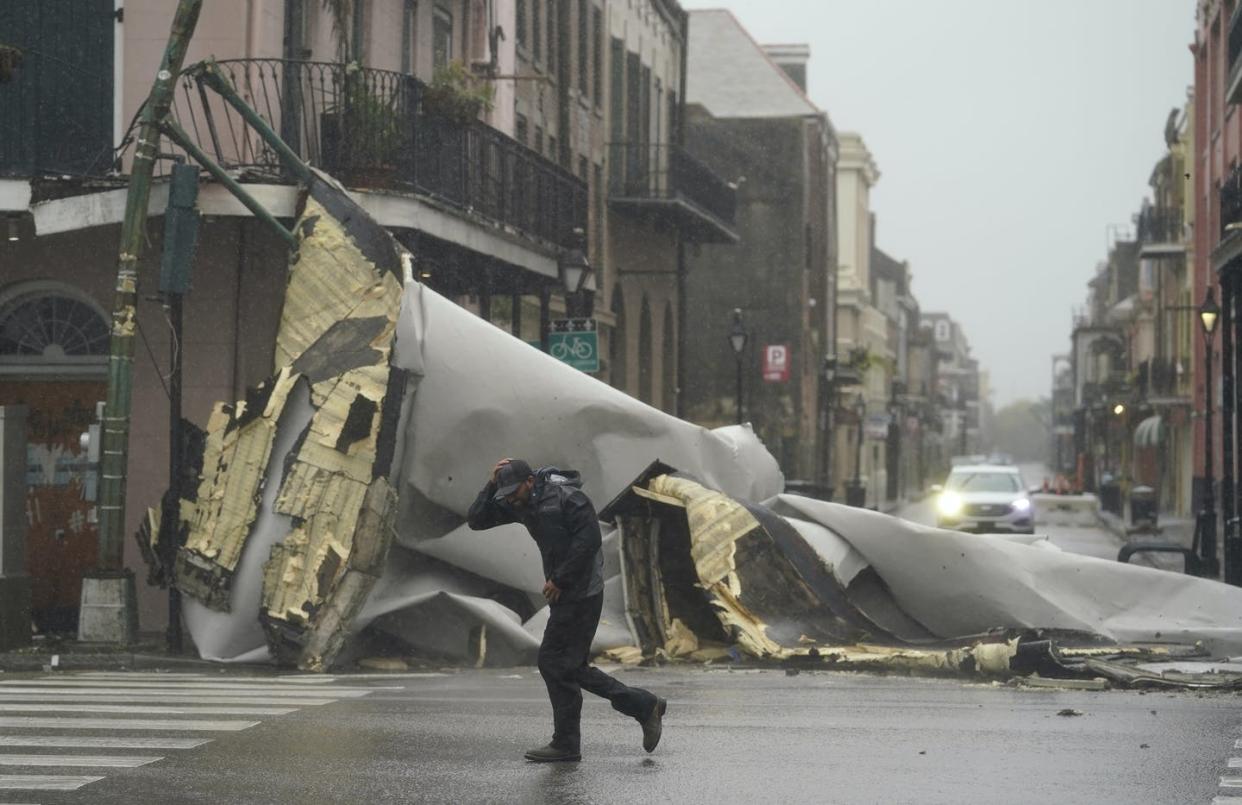 <span class="caption">Hurricane Ida's winds tore off roofs, including in New Orleans' French Quarter.</span> <span class="attribution"><a class="link " href="https://newsroom.ap.org/detail/APTOPIXTropicalWeatherAtlantic/8d34a9cf7a294a3b980415af25a2e64f/photo" rel="nofollow noopener" target="_blank" data-ylk="slk:AP Photo/Eric Gay;elm:context_link;itc:0;sec:content-canvas">AP Photo/Eric Gay</a></span>
