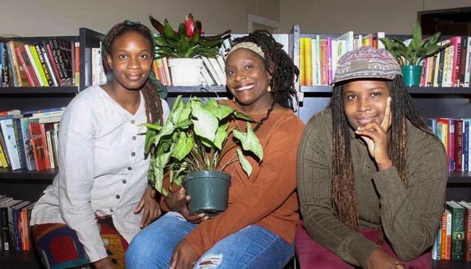 Family members Le’Ecia Farmer, left, Deatria Williams, and LaKecia Farmer own Parable – a unique bookstore and boutique on McKinley Avenue in East Tacoma that fosters community spirit and connection.