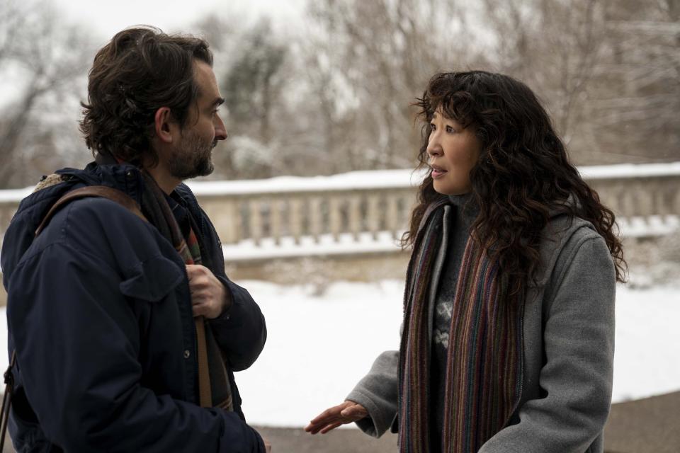 This image released by Netflix shows Jay Duplass, left, and Sandra Oh in a scene from "The Chair." (Eliza Morse/Netflix via AP)