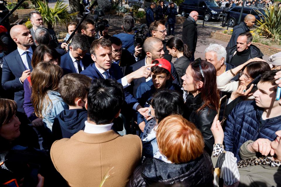 Mr Macron spoke to voters outside Denain town hall (AFP via Getty Images)