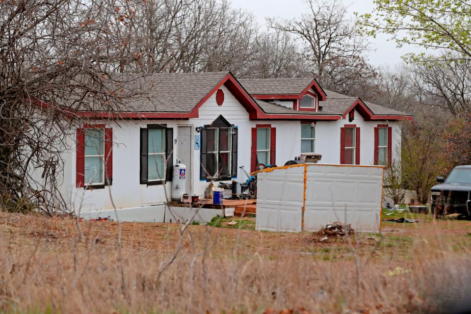 The property at 21 Walker Lane in McLoud is pictured March 8. David Orr was allegedly killed in a bedroom, possibly at the direction of Mikell Patrick "Bulldog" Smith, a three-time convicted murderer.
