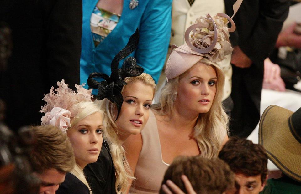 LONDON, ENGLAND - APRIL 29: Earl Spencer's daughter's (L-R) Lady Amelia, Lady Eliza and Lady Kitty sit together inside  Westminster Abbey ahead of the Royal Wedding of Prince William to Catherine Middleton at Westminster Abbey on April 29, 2011 in London, England. The marriage of the second in line to the British throne is to be led by the Archbishop of Canterbury and will be attended by 1900 guests, including foreign Royal family members and heads of state. Thousands of well-wishers from around the world have also flocked to London to witness the spectacle and pageantry of the Royal Wedding.  (Photo by Dave Thompson - WPA Pool/Getty Images)