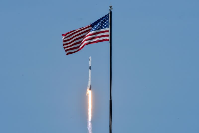 A SpaceX Falcon 9 rocket and Crew Dragon spacecraft carrying NASA astronauts Douglas Hurley and Robert Behnken lifts off during NASA's SpaceX Demo-2 mission to the International Space Station from NASA's Kennedy Space Center in Cape Canaveral