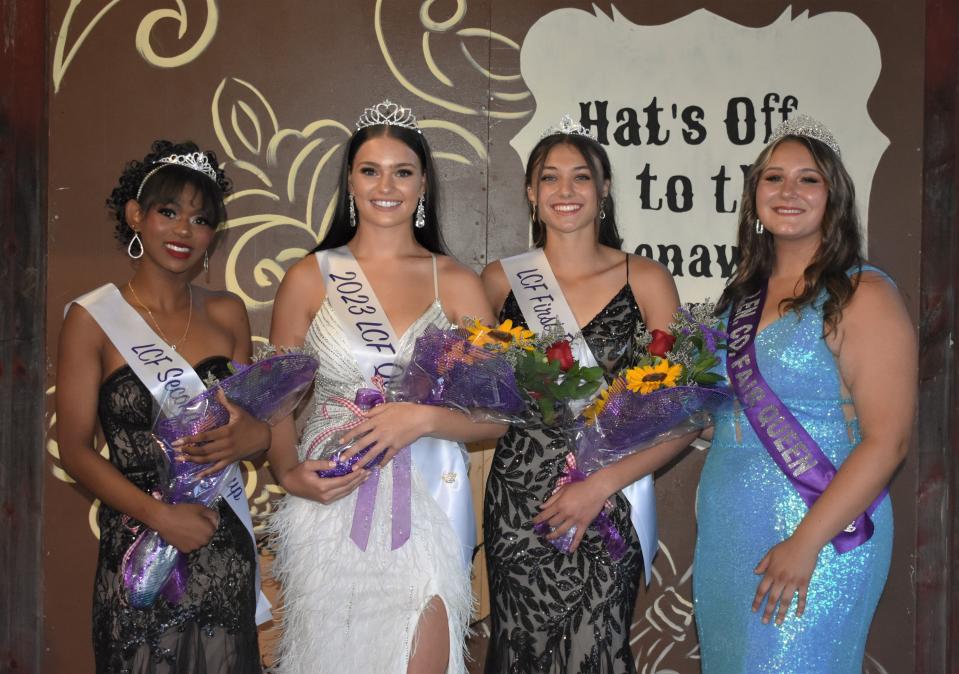 Emily Maran, second from left, was named the 2023 Lenawee County fair queen during Sunday's annual contest at the bandshell. She is pictured with her court and Kindell Covey, right, Lenawee County Fair Queen 2022. Court members are Abyona Freeman, left, second runner-up, and Tanana Emmendorfer, first runner-up.