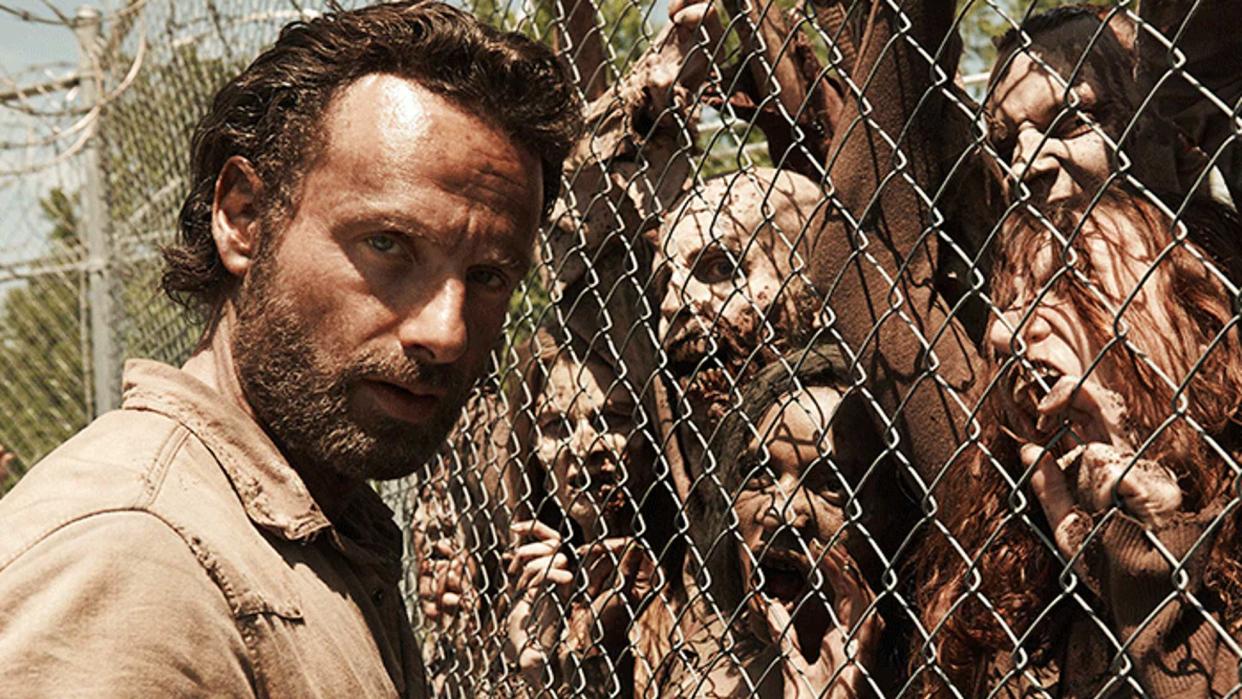  Andrew Lincoln and zombies in The Walking Dead. 