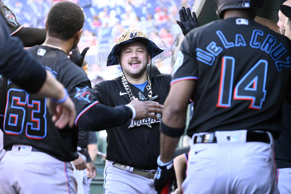 Miami Marlins' Jake Burger celebrates his home run during the third inning of a baseball game against the Washington Nationals, Saturday, Sept. 2, 2023, in Washington. (AP Photo/Nick Wass)