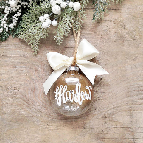 <p>$15, <a rel="nofollow noopener" href="https://www.etsy.com/listing/252085154/custom-holiday-ornament-custom-holiday?ref=related-4" target="_blank" data-ylk="slk:Etsy;elm:context_link;itc:0;sec:content-canvas" class="link ">Etsy</a></p>