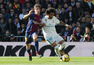 <p>Soccer Football – La Liga Santander – Real Madrid vs FC Barcelona – Santiago Bernabeu, Madrid, Spain – December 23, 2017 Real Madrid’s Marcelo in action with Barcelona’s Sergi Roberto REUTERS/Sergio Perez </p>