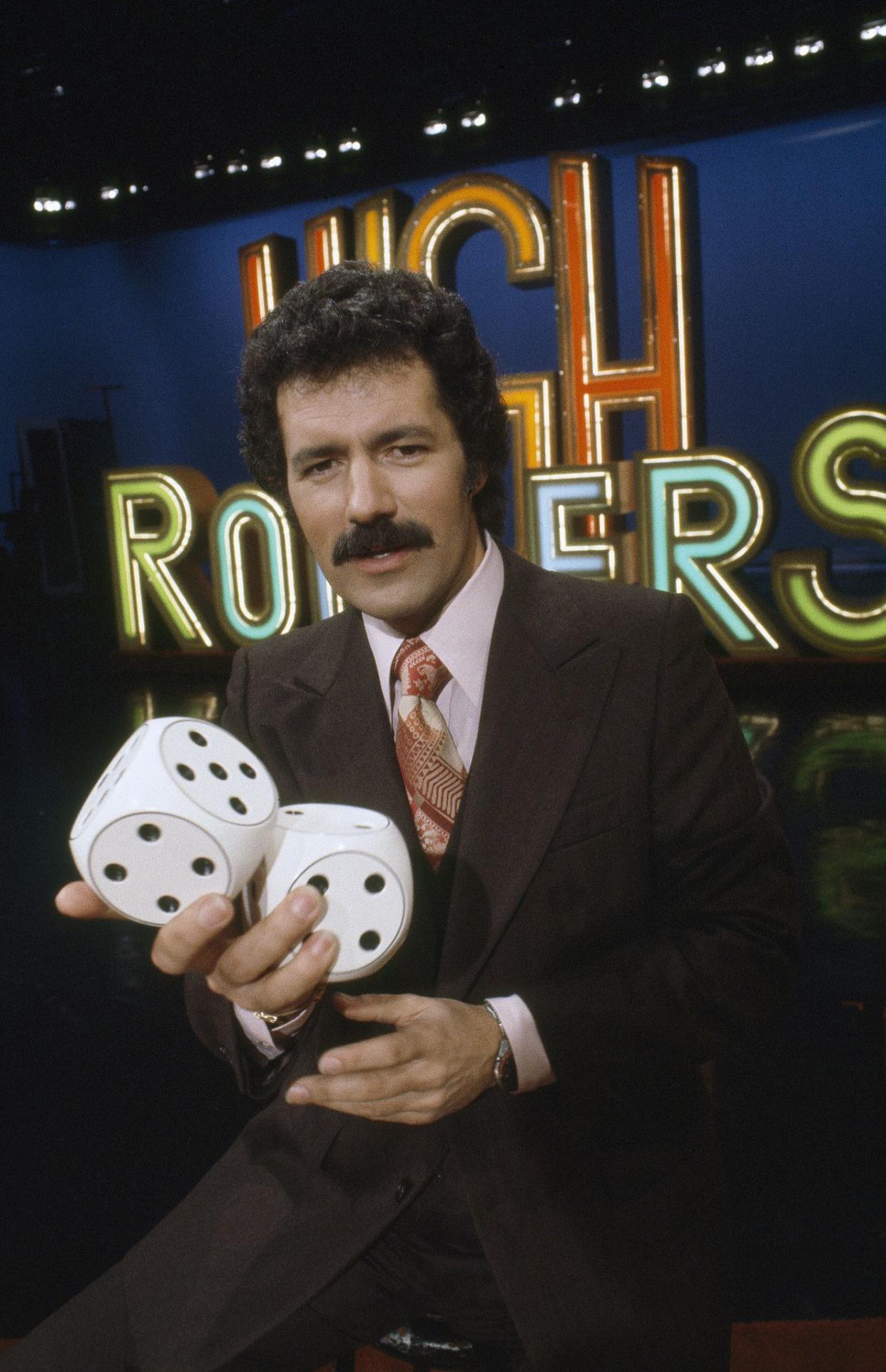 Alex Trebek on the set of "High Rollers". Trebek hosted the NBC show from 1974 to 1980.
